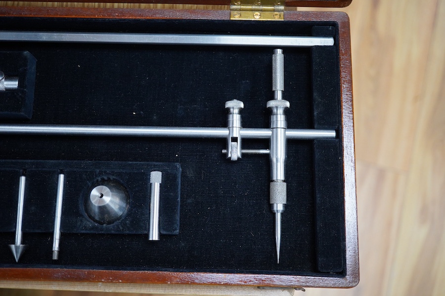 A wooden boxed Rolls stainless steel beam compass, box 53cm x 19cm. Condition - box scratched, compass good, no elements missing